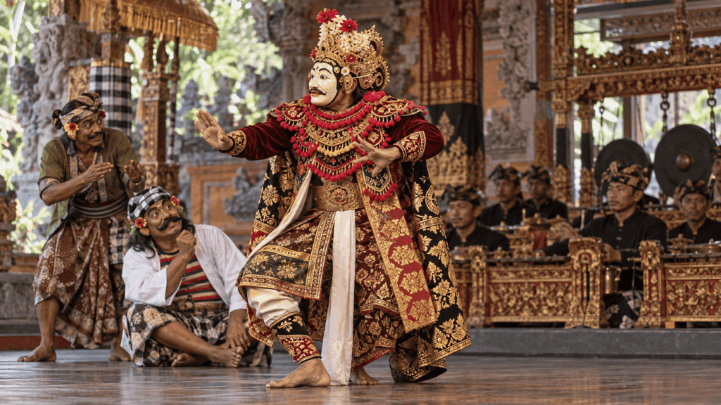 Balinese Topeng dancer performing in a carved mask and traditional costume with gamelan musicians.